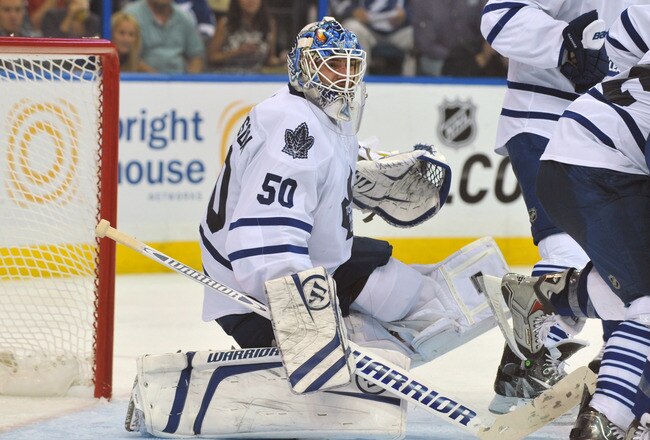 TAMPA, FL - NOVEMBER 22: Goalie Jonas Gustavsson #50 of the Toronto Maple Leafs stops a shot by the Tampa Bay Lightning  November 22, 2011 at St. Pete Times Forum in Tampa, Florida.  (Photo by Al Messerschmidt/Getty Images)