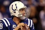 INDIANAPOLIS, IN - JANUARY 08:  Quarterback Peyton Manning #18 of the Indianapolis Colts looks to pass against the New York Jets during their 2011 AFC wild card playoff game at Lucas Oil Stadium on January 8, 2011 in Indianapolis, Indiana. The Jets won 17-16.  (Photo by Jonathan Daniel/Getty Images)