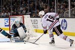 SAN JOSE, CA - NOVEMBER 23:  Antti Niemi #31 of the San Jose Sharks makes a save on a shot taken by Jonathan Toews #19 of the Chicago Blackhawks at HP Pavilion at San Jose on November 23, 2011 in San Jose, California.  (Photo by Ezra Shaw/Getty Images)