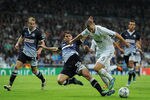 MADRID, SPAIN - NOVEMBER 22:  Karim Benzema (R) of Real Madrid fights for the ball with Leandro Cufre of GNK Dinamo Zagreb during the UEFA Champions League group D match between Real Madrid and GNK Dinamo Zagreb at Estadio Santiago Bernabeu on November 22, 2011 in Madrid, Spain.  (Photo by Jasper Juinen/Getty Images)