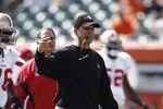 CINCINNATI, OH - SEPTEMBER 25:  Head Coach Jim Harbaugh of the San Francisco 49ers instructs his team before the game against the Cincinnati Bengals on September 25, 2011 at Paul Brown Stadium in Cincinnati, Ohio.  (Photo by John Grieshop/Getty Images)