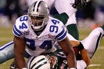EAST RUTHERFORD, NJ - SEPTEMBER 11:  DeMarcus Ware #94 of the Dallas Cowboys sacks Mark Sanchez #6 of the New York Jets in the first half during their NFL Season Opening Game at MetLife Stadium on September 11, 2011 in East Rutherford, New Jersey.  (Photo by Jeff Zelevansky/Getty Images)