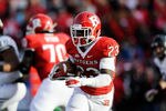 NEW BRUNSWICK, NJ - NOVEMBER 19:  Jawan Jamison #23 of the Rutgers Scarlet Knights runs the ball against the Cincinnati Bearcats at Rutgers Stadium on November 19, 2011 in New Brunswick, New Jersey.  (Photo by Patrick McDermott/Getty Images)