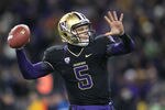 SEATTLE - NOVEMBER 05:  Quarterback Nick Montana #5 of the Washington Huskies throws a 53 yard pass against the Oregon Ducks on November 5, 2011 at Husky Stadium in Seattle, Washington. The Ducks defeated the Huskies 34-17. (Photo by Otto Greule Jr/Getty Images)