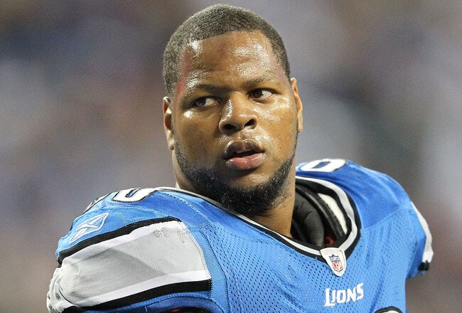 DETROIT, MI - NOVEMBER 24: Ndamukong Suh #90 of the Detroit Lions talks with the official during the game against the Green Bay Packers at Ford Field on November 24, 2011 in Detroit, Michigan. The Packers defeated the Lions 27-15.  (Photo by Leon Halip/Getty Images)
