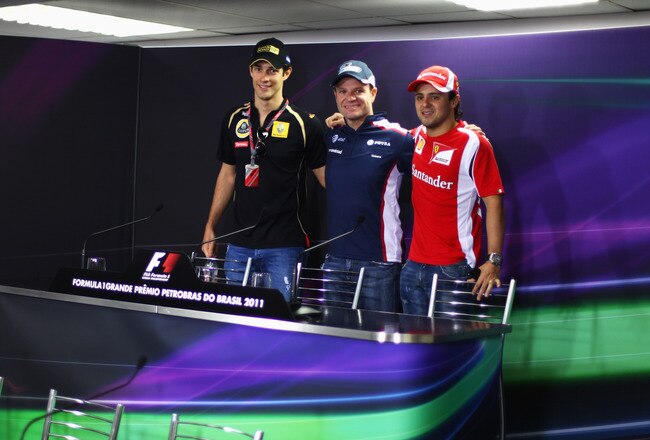 SAO PAULO, BRAZIL - NOVEMBER 24:  (L-R) Brazilian F1 drivers Bruno Senna of Renault, Rubens Barrichello of Williams and Felipe Massa of Ferrari pose for a group photograph at the drivers press conference during previews to the Brazilian Formula One Grand Prix at the Autodromo Jose Carlos Pace on November 24, 2011 in Sao Paulo, Brazil.  (Photo by Clive Mason/Getty Images)