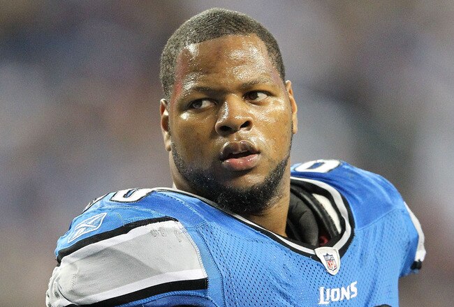 DETROIT, MI - NOVEMBER 24: Ndamukong Suh #90 of the Detroit Lions talks with the official during the game against the Green Bay Packers at Ford Field on November 24, 2011 in Detroit, Michigan. The Packers defeated the Lions 27-15.  (Photo by Leon Halip/Getty Images)