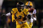 MORGANTOWN, WV - SEPTEMBER 24: Stedman Bailey #3 of the West Virginia Mountaineers catches a pass in front of Tharold Simon #24 of the Louisiana State University Tigers in the first half during the game on September 24, 2011 at Mountaineer Field in Morgantown, West Virginia.  (Photo by Jared Wickerham/Getty Images)