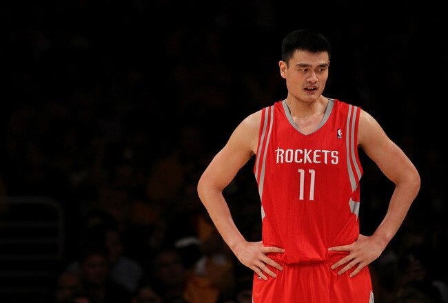 LOS ANGELES, CA - OCTOBER 26:  Yao Ming #11 of the Houston Rockets looks on during their opening night game against the Los Angeles Lakers at Staples Center on October 26, 2010 in Los Angeles, California. NOTE TO USER: User expressly acknowledges and agrees that, by downloading and or using this photograph, User is consenting to the terms and conditions of the Getty Images License Agreement.  (Photo by Jeff Gross/Getty Images)