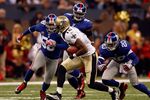 NEW ORLEANS - OCTOBER 18:  Marques Colston #12 of the New Orleans Saints runs with the ball during the game against the New York Giants at the Louisiana Superdome on October 18, 2009 in New Orleans, Louisiana.  (Photo by Chris Graythen/Getty Images)