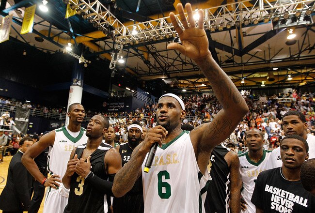 MIAMI, FL - OCTOBER 08:  (L-R) Chris Bosh, Dwyane Wade, and LeBron James address the fans during the South Florida All Star Classic at Florida International University on October 8, 2011 in Miami, Florida.  (Photo by Mike Ehrmann/Getty Images)