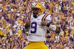 BATON ROUGE, LA - NOVEMBER 25:  Jordan Jefferson #9 of the Louisiana State University Tigers celebrates after scoring a touchdown during the game against the Arkansas Razorbacks at Tiger Stadium on November 25, 2011 in Baton Rouge, Louisiana.  The Louisiana State University Tigers defeated the Arkansas Razorbacks 41-17 (Photo by Chris Graythen/Getty Images)