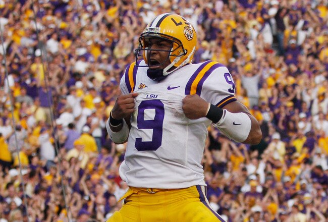 BATON ROUGE, LA - NOVEMBER 25:  Jordan Jefferson #9 of the Louisiana State University Tigers celebrates after scoring a touchdown during the game against the Arkansas Razorbacks at Tiger Stadium on November 25, 2011 in Baton Rouge, Louisiana.  The Louisiana State University Tigers defeated the Arkansas Razorbacks 41-17 (Photo by Chris Graythen/Getty Images)
