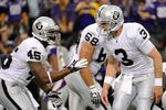 MINNEAPOLIS, MN - NOVEMBER 20: Carson Palmer #3 of the Oakland Raiders calls a play on the line of scrimmage to Marcel Reece #45 in the fourth quarter against the Minnesota Vikings on November 20, 2011 at Hubert H. Humphrey Metrodome in Minneapolis, Minnesota. The Raiders defeated the Vikings 27-21. (Photo by Hannah Foslien/Getty Images)