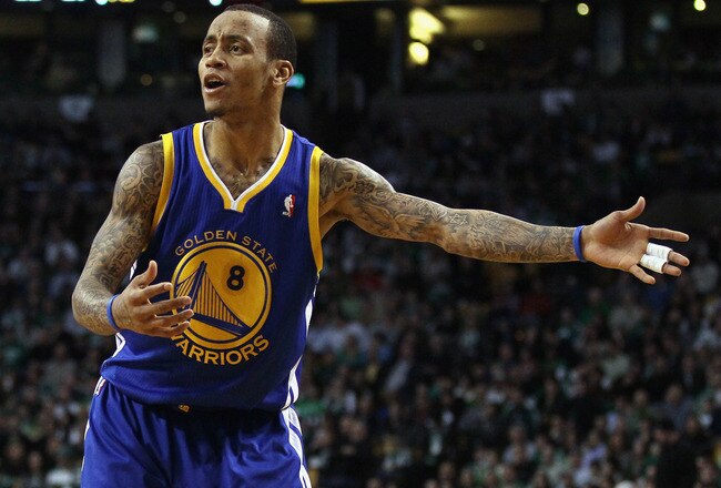 BOSTON, MA - MARCH 04:  Monta Ellis #8 of the Golden State Warriors reacts after the ball is given to the Boston Celtics on March 4, 2011 at the TD Garden in Boston, Massachusetts.  The Celtics defeated the Warriors 107-103. NOTE TO USER: User expressly acknowledges and agrees that, by downloading and/or using this Photograph, User is consenting to the terms and conditions of the Getty Images License Agreement.  (Photo by Elsa/Getty Images)