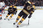 UNIONDALE, NY - NOVEMBER 19:  Chris Kelly #23 of the Boston Bruins celebrates his goal against the New York Islanders at 18:45 of the first period at the Nassau Veterans Memorial Coliseum on November 19, 2011 in Uniondale, New York.  (Photo by Bruce Bennett/Getty Images)