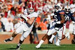 AUBURN, AL - NOVEMBER 26:  Brad Smelley #17 of the Alabama Crimson Tide takes a reception upfield past Daren Bates #25 of the Auburn Tigers at Jordan-Hare Stadium on November 26, 2011 in Auburn, Alabama.  (Photo by Kevin C. Cox/Getty Images)