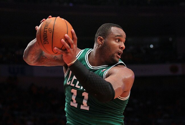 NEW YORK, NY - APRIL 24:  Glen Davis #11 of the Boston Celtics controls a rebound against the New York Knicks in Game Four of the Eastern Conference Quarterfinals during the 2011 NBA Playoffs on April 24, 2011 at Madison Square Garden in New York City. The Celtics won 101-89. NOTE TO USER: User expressly acknowledges and agrees that, by downloading and or using this photograph, User is consenting to the terms and conditions of the Getty Images License Agreement  (Photo by Nick Laham/Getty Images)