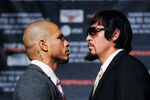 NEW YORK, NY - SEPTEMBER 20:  Professional Boxers Miguel Cotto (L) and Antonio Margarito pose for the media after a press conference at the Edison Ballroom on September 20, 2011 in New York City.  (Photo by Patrick McDermott/Getty Images)