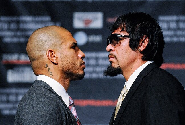 NEW YORK, NY - SEPTEMBER 20:  Professional Boxers Miguel Cotto (L) and Antonio Margarito pose for the media after a press conference at the Edison Ballroom on September 20, 2011 in New York City.  (Photo by Patrick McDermott/Getty Images)