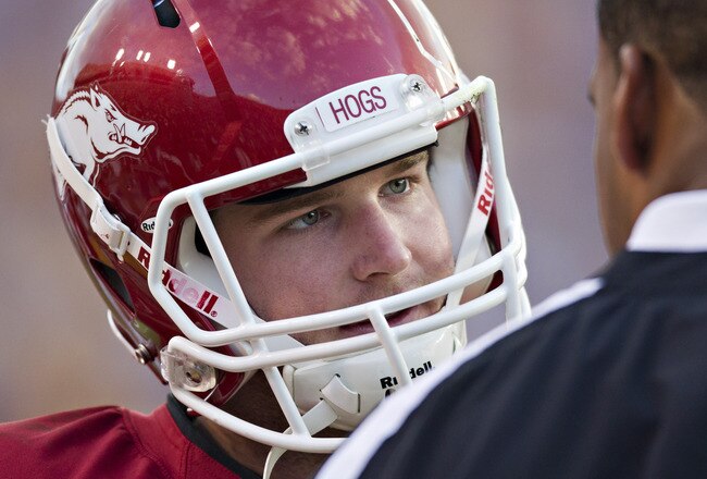 BATON ROUGE, LA - NOVEMBER 25:   Quarterback Tyler Wilson #8 talks with quarterback coach Garrick McGee of the Arkansas Razorbacks during a game against the LSU Tigers at Tiger Stadium on November 25, 2011 in Baton Rouge, Louisiana.  The Tigers defeated the Razorbacks 41 to 17.  (Photo by Wesley Hitt/Getty Images)