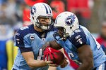 NASHVILLE, TN - NOVEMBER 27:   Matt Hasselbeck #8 hands off the ball to Ahmard Hall #45 of the Tennessee Titans during a game against the Tampa Bay Buccaneers at LP Field on November 27, 2011 in Nashville, Tennessee.  The Titans defeated the Buccaneers 23 to 17.  (Photo by Wesley Hitt/Getty Images)