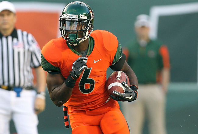 MIAMI - NOVEMBER 20:  Lamar Miller #6 of the Miami Hurricanes runs for a touchdown during a game against the Virginia Tech Hokies at Sun Life Stadium on November 20, 2010 in Miami, Florida.  (Photo by Mike Ehrmann/Getty Images)