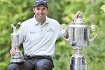 BOSTON;MA - AUGUST 28:  Golfer Padraig Harrington of Ireland poses with the Claret Jug and Wanamaker Trophy following his wins in the 137th Open Championship at Royal Birkdale and the 90th PGA Championship at Oakland Hills during a photoshoot in Boston, MA,USA on the 28th of August 2008. (Photo by David Cannon/Getty Images)
