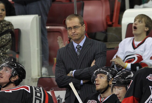 RALEIGH, NC - NOVEMBER 29: Head coach Paul Maurice of the Carolina Hurricanes reflects during a time out in his game against the Dallas Stars at the RBC Center on November 29, 2010 in Raleigh, North Carolina.  (Photo by Bruce Bennett/Getty Images)