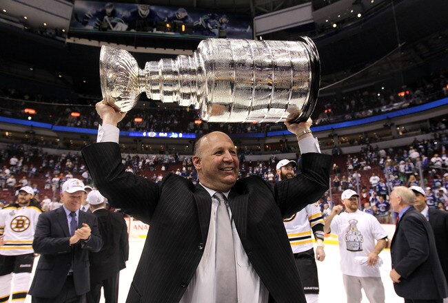 VANCOUVER, BC - JUNE 15:  Head coach Claude Julien pose with the Stanley Cup after defeating the Vancouver Canucks in Game Seven of the 2011 NHL Stanley Cup Final at Rogers Arena on June 15, 2011 in Vancouver, British Columbia, Canada. The Boston Bruins defeated the Vancouver Canucks 4 to 0.  (Photo by Bruce Bennett/Getty Images)