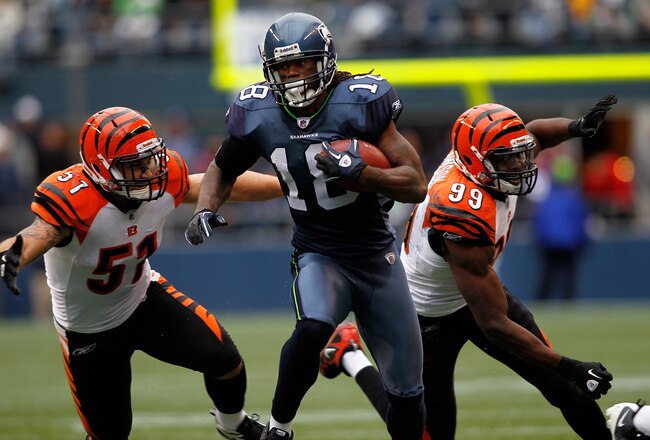 SEATTLE - OCTOBER 30:  Sidney Rice #18 of the Seattle Seahawks runs after making a catch against the Cincinnati Bengals on October 30, 2011 at Century Link Field in Seattle, Washington.  (Photo by Jonathan Ferrey/Getty Images)