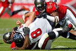 TAMPA, FL - NOVEMBER 13:  Defensive tackle Brain Price #92 of the Tampa Bay Buccaneers sacks quarterback Matt Schaub #8 of the Houston Texans as linebacker Geno Hayes #54 cleans up during the game at Raymond James Stadium on November 13, 2011 in Tampa, Florida.  (Photo by J. Meric/Getty Images)