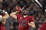 STANFORD, CA - NOVEMBER 26:  Andrew Luck #12 of the Stanford Cardinal throws the ball against the Notre Dame Fighting Irish at Stanford Stadium on November 26, 2011 in Stanford, California.  (Photo by Ezra Shaw/Getty Images)