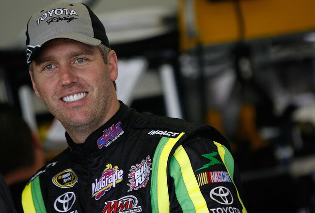 DAYTONA BEACH, FL - FEBRUARY 14:  Jeremy Mayfield, driver of the #41 Allsport Toyota, stands in the garage area during practice for the NASCAR Sprint Cup Series Daytona 500 at Daytona International Speedway on February 14, 2009 in Daytona Beach, Florida.  (Photo by Chris Graythen/Getty Images)