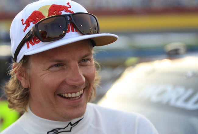 CHARLOTTE, NC - MAY 20:  Kimi Raikkonen, driver of the #15 Perky Jerky Toyota, stands on the starting grid prior to the NASCAR Camping World Truck Series North Carolina Education Lottery 200 at Charlotte Motor Speedway on May 20, 2011 in Charlotte, North Carolina.  (Photo by Streeter Lecka/Getty Images)