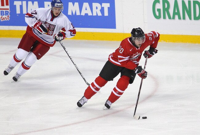 BUFFALO, NY - DECEMBER 28: Louis Leblanc #20 of Canada skates ahead of Jakub Orsava #27  of the Czech Republic during the 2011 IIHF World U20 Championship game between Canada and Czech Republic on December 28, 2010 in Buffalo, New York.  (Photo by Rick Stewart/Getty Images)