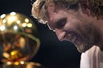 DALLAS, TX - JUNE 16:  Dirk Nowitzki of the Dallas Mavericks talks after the Dallas Mavericks Victory Parade at American Airlines Center on June 16, 2011 in Dallas, Texas.  (Photo by Ronald Martinez/Getty Images)