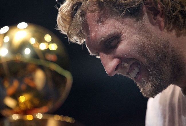 DALLAS, TX - JUNE 16:  Dirk Nowitzki of the Dallas Mavericks talks after the Dallas Mavericks Victory Parade at American Airlines Center on June 16, 2011 in Dallas, Texas.  (Photo by Ronald Martinez/Getty Images)