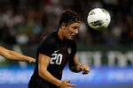 PORTLAND, OR - SEPTEMBER 22:  Abby Wambach #20 of the United States attempts to hed the ball against  Canada on September 22, 2011 at Jeld-Wen Field in Portland, Oregon.  (Photo by Jonathan Ferrey/Getty Images)
