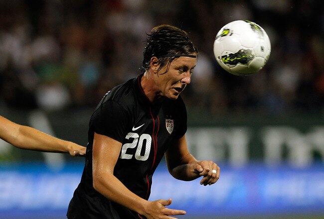 PORTLAND, OR - SEPTEMBER 22:  Abby Wambach #20 of the United States attempts to hed the ball against  Canada on September 22, 2011 at Jeld-Wen Field in Portland, Oregon.  (Photo by Jonathan Ferrey/Getty Images)