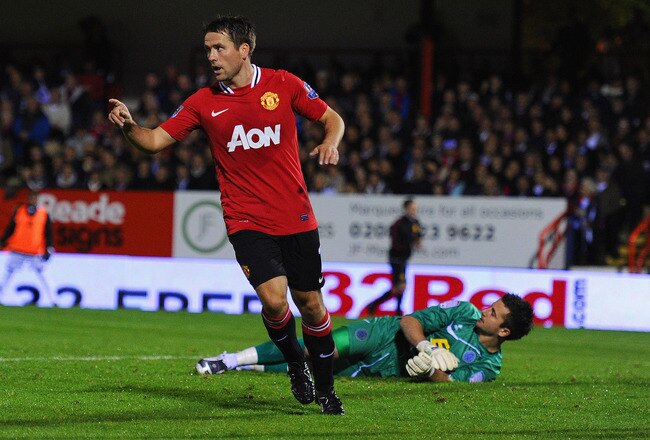 ALDERSHOT, ENGLAND - OCTOBER 25:  Michael Owen of Manchester United celebrates scoring to make it 2-0 during the Carling Cup fourth round match between Aldershot Town and Manchester United at the EBB Stadium, Recreation Ground on October 25, 2011 in Aldershot, England.  (Photo by Michael Regan/Getty Images)