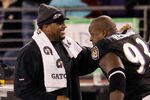 BALTIMORE, MD - NOVEMBER 24:  Ray Lewis #52 of the Baltimore Ravens and teammate Cory Redding #93 share a laugh on the sidelines during the second half of the Ravens 16-6 win over the San Francisco 49ers at M&T Bank Stadium on November 24, 2011 in Baltimore, Maryland.  (Photo by Rob Carr/Getty Images)