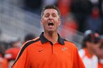 STILLWATER, OK - OCTOBER 29:  Head Coach Mike Gundy of the Oklahoma State Cowboys questions a call in the second half against the Baylor Bears on October 29, 2011 at Boone Pickens Stadium in Stillwater, Oklahoma.  Oklahoma State defeated Baylor 59-24.  (Photo by Brett Deering/Getty Images)