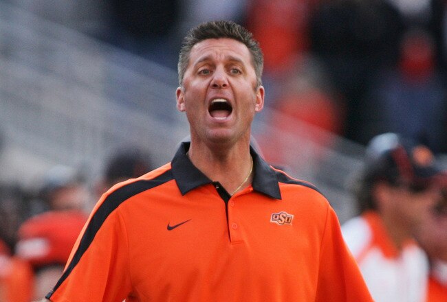 STILLWATER, OK - OCTOBER 29:  Head Coach Mike Gundy of the Oklahoma State Cowboys questions a call in the second half against the Baylor Bears on October 29, 2011 at Boone Pickens Stadium in Stillwater, Oklahoma.  Oklahoma State defeated Baylor 59-24.  (Photo by Brett Deering/Getty Images)