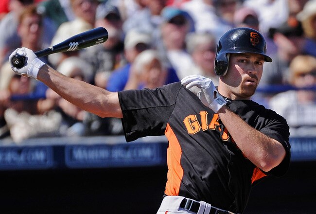 PEORIA, AZ - MARCH 08:  Nate Schierholtz #12 of the San Francisco Giants during the spring training baseball game against Seattle Mariners at Peoria Stadium on March 8, 2011 in Peoria, Arizona.  (Photo by Kevork Djansezian/Getty Images)