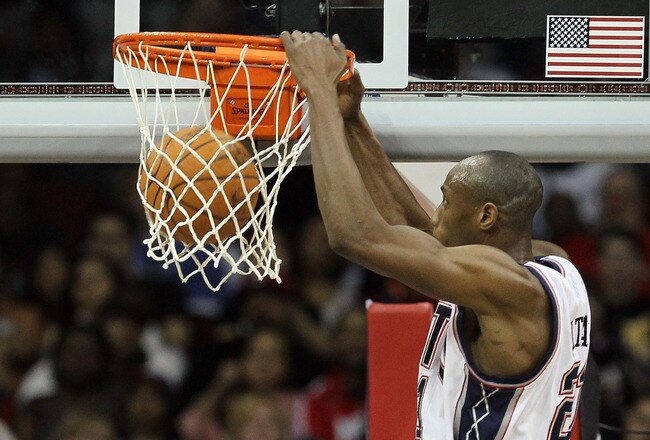 NEWARK, NJ - APRIL 03:  Travis Outlaw #21 of the New Jersey Nets dunks against the Miami Heat at the Prudential Center on April 3, 2011 in Newark, New Jersey.The Heat defeated the Nets 108-94.NOTE TO USER: User expressly acknowledges and agrees that, by downloading and/or using this Photograph, user is consenting to the terms and conditions of the Getty Images License Agreement.  (Photo by Jim McIsaac/Getty Images)