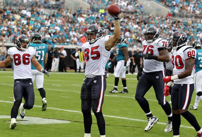 JACKSONVILLE, FL - NOVEMBER 27:  Joel Dreessen #85 of the Houston Texans celebrates following a touchdown during the game against the Jacksonville Jaguars at EverBank Field on November 27, 2011 in Jacksonville, Florida.  (Photo by Sam Greenwood/Getty Images)
