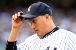 NEW YORK, NY - OCTOBER 02:  Freddy Garcia #36 of the New York Yankees walks off the field after the first inning of Game Two of the American League Division Series against the Detroit Tigers at Yankee Stadium on October 2, 2011 in New York City.  (Photo by Chris Trotman/Getty Images)
