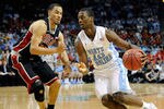 LAS VEGAS, NV - NOVEMBER 26:  Harrison Barnes #40 of the North Carolina Tar Heels drives against Chace Stanback #22 of the UNLV Rebels during the championship game of the Continental Tire Las Vegas Invitational at the Orleans Arena November 26, 2011 in Las Vegas, Nevada. UNLV won 90-80. (Photo by Ethan Miller/Getty Images)