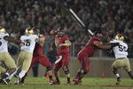 STANFORD, CA - NOVEMBER 26:  Andrew Luck #12 of the Stanford Cardinal in action against the Notre Dame Fighting Irish at Stanford Stadium on November 26, 2011 in Stanford, California.  (Photo by Ezra Shaw/Getty Images)